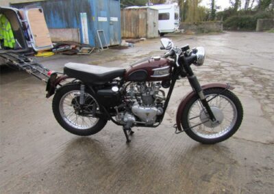 1959 Triumph 6T with TR5 close fin motor